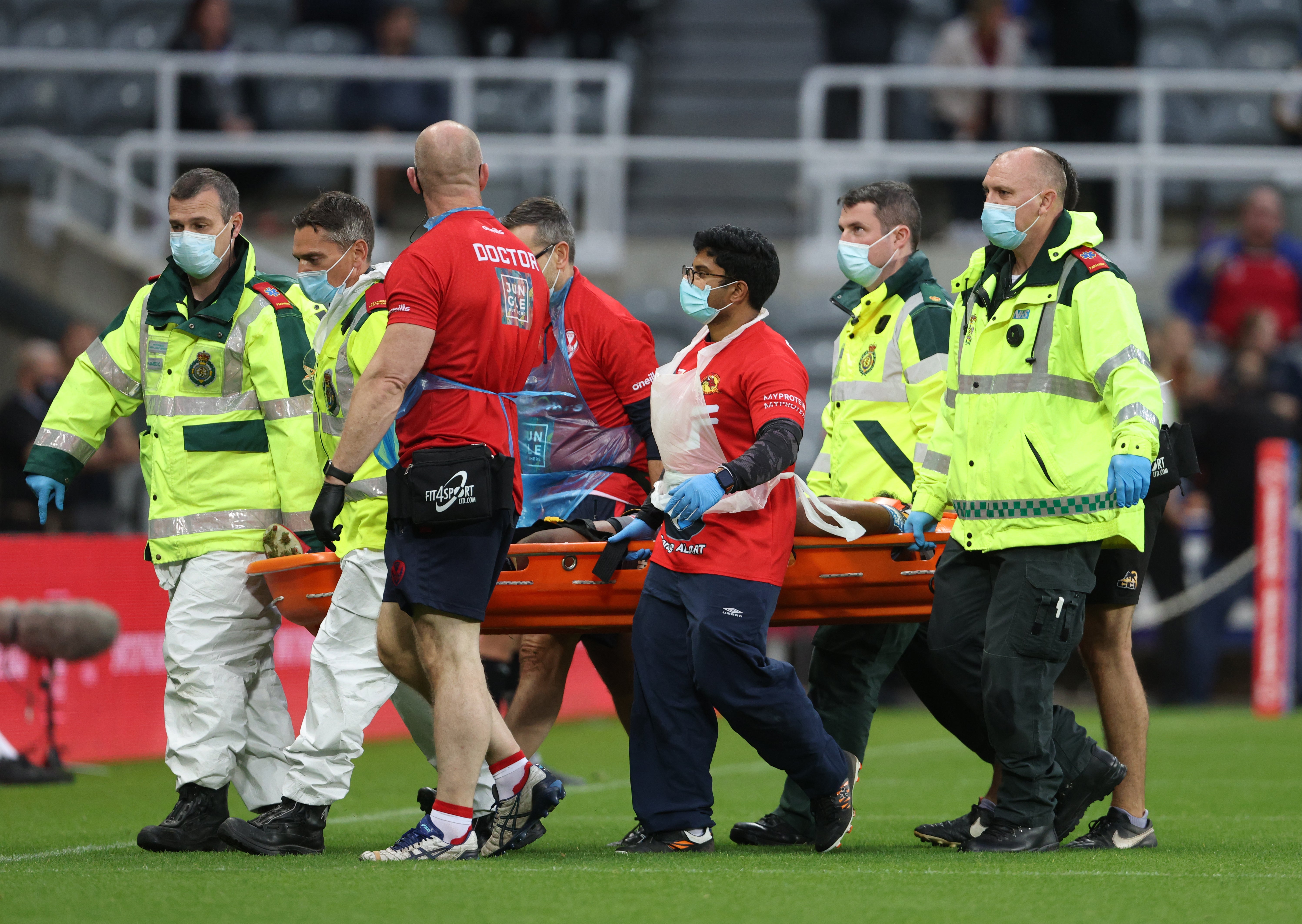 Samisoni Langi is stretchered off after suffering an injury (Richard Sellers/PA)