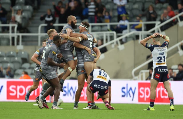 Catalans Dragons players celebrate after James Maloney’s drop goal (Richard Sellers/PA)