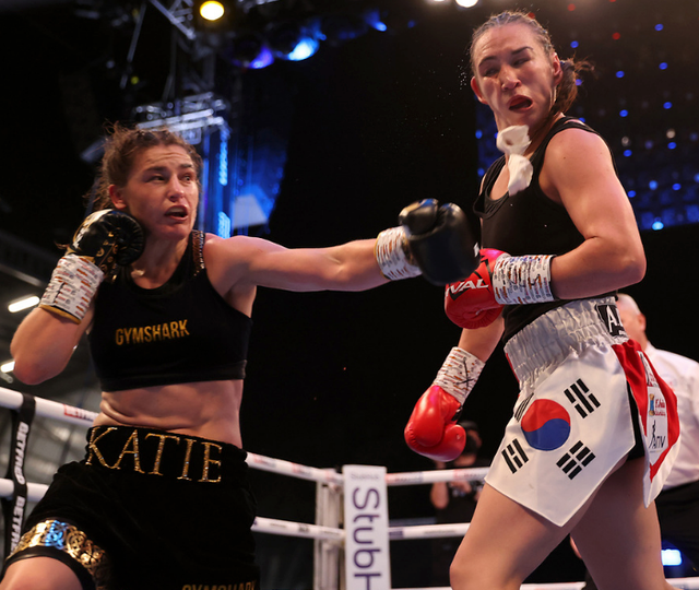 <p>Katie Taylor lands a heavy shot on Jennifer Han</p>