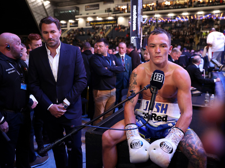 Warrington appears dejected after his technical draw with Lara