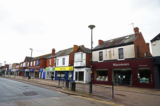 A quiet high street in West Bridgford, Nottingham. Research shows shops in Britain closed at an average of nearly 50 per day during the first half of the year (Tim Goode/PA)