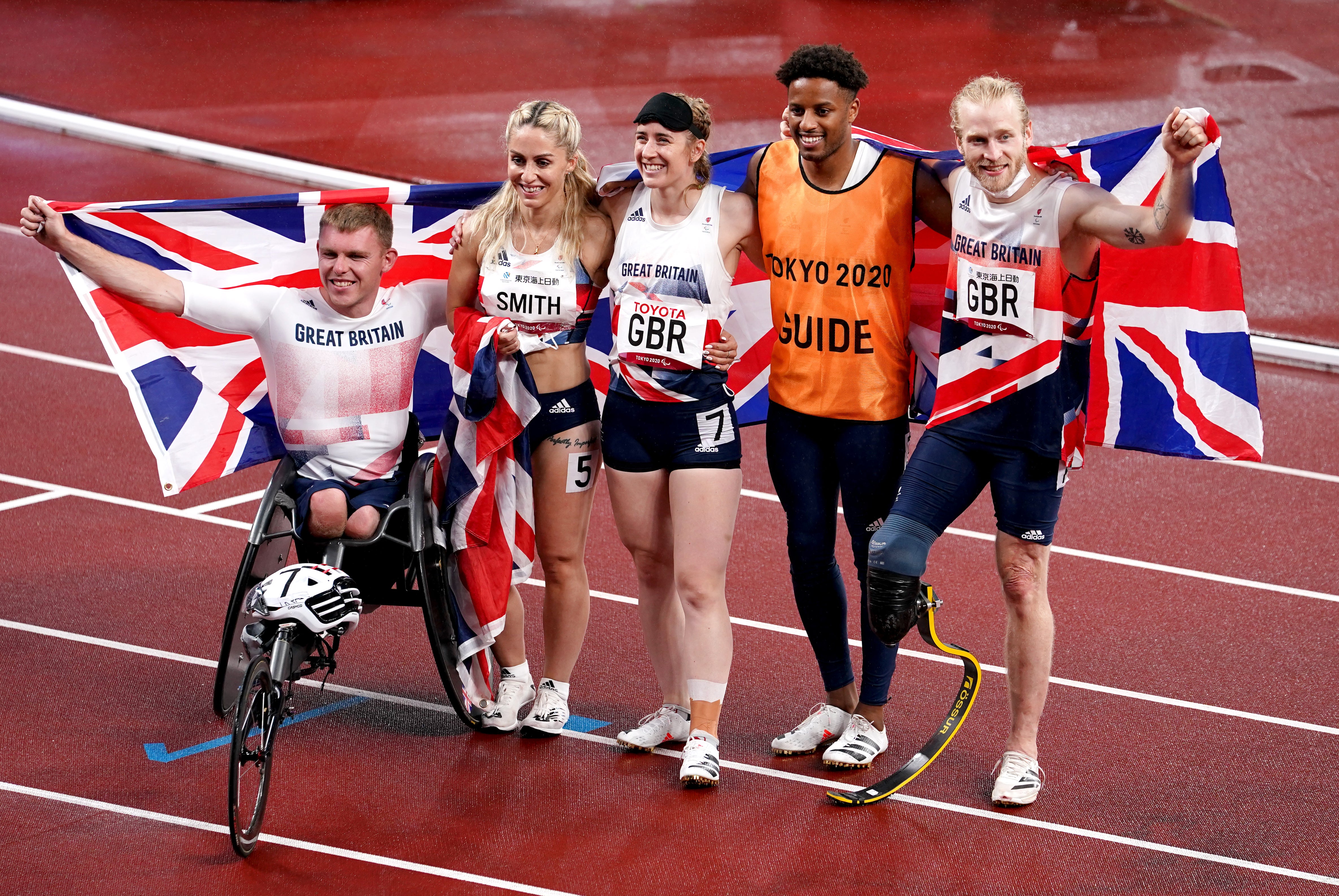 Great Britain’s (left-right) Nathan Maguire, Ali Smith, Libby Clegg, guide Chris Clarke and Jonnie Peacock after winning bronze in the universal 4x100m (John Walton/PA)