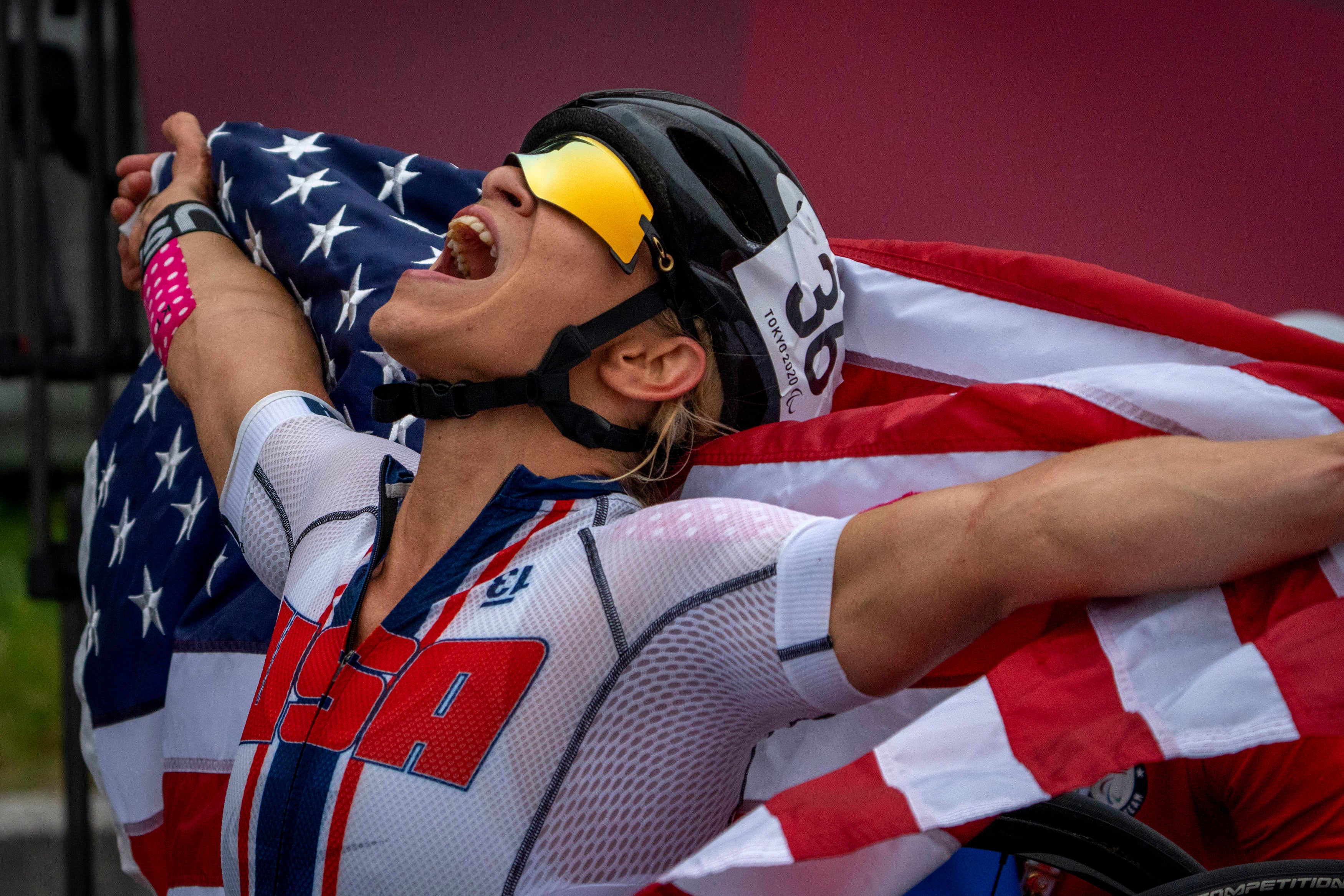 USA’s Oksana Masters celebrates after wining the women’s H5 road race (Emilio Morenatti/PA)