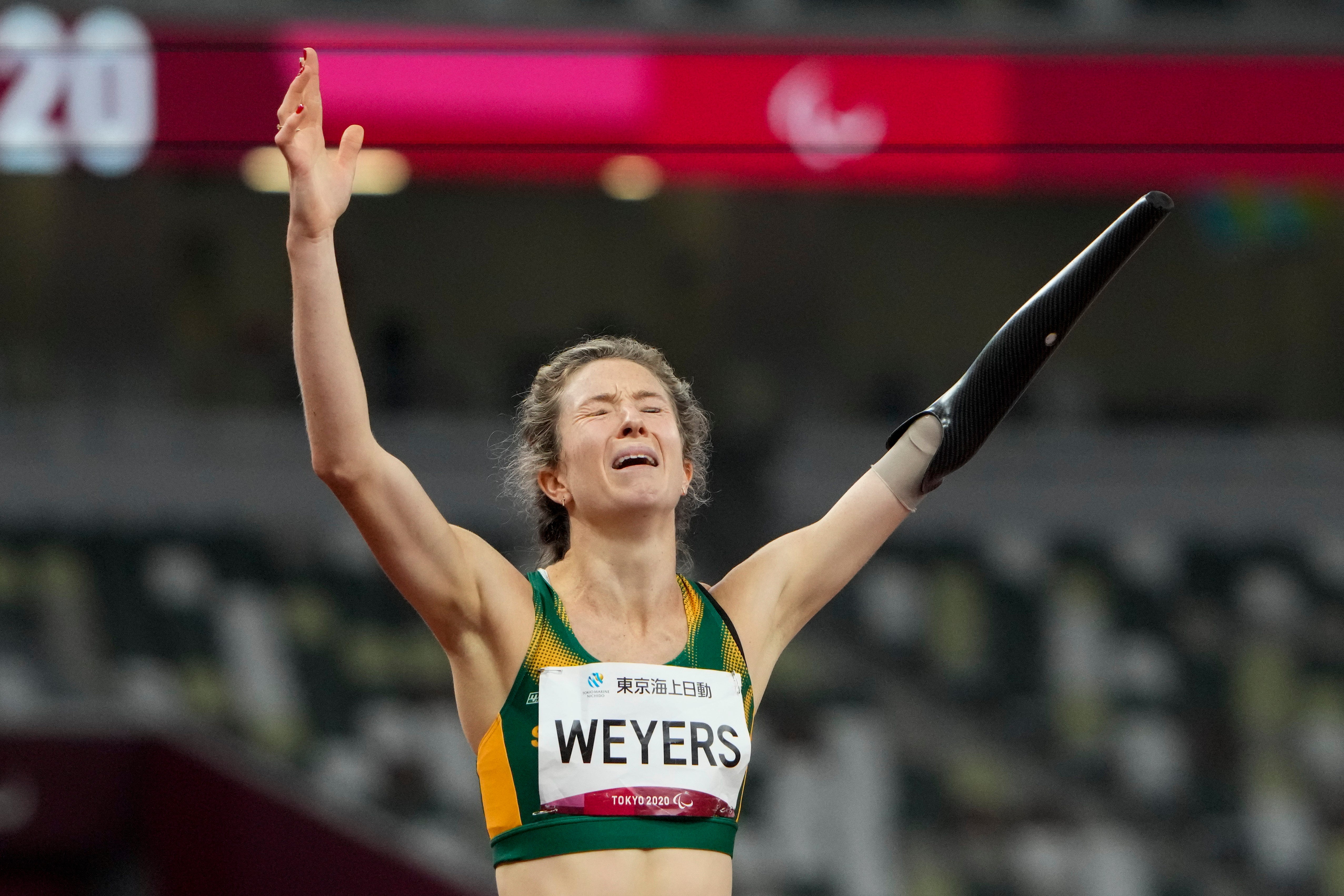 South Africa’s Anrune Weyers reacts after winning the women’s T47 400m final (Eugene Hoshiko/AP)