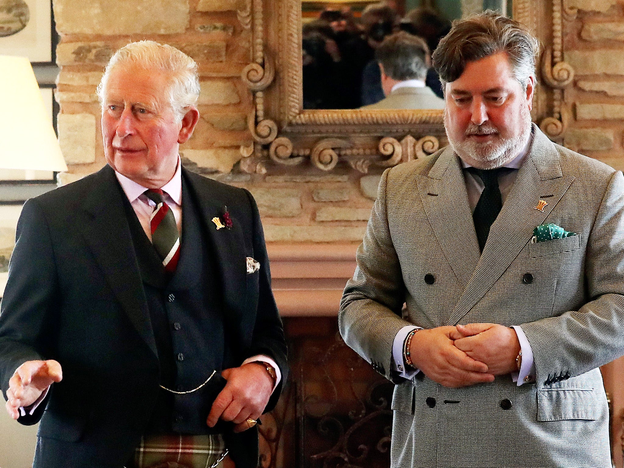 King Charles, then the Prince of Wales, and former charity chief executive Michael Fawcett in Scotland