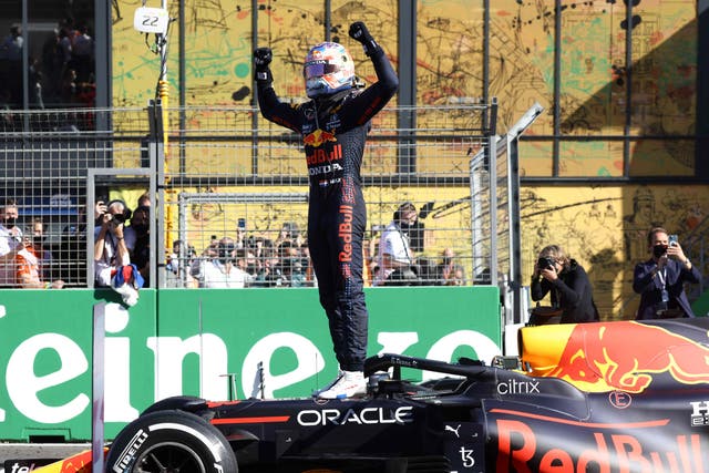 <p>Max Verstappen celebrates winning the Dutch Grand Prix</p>