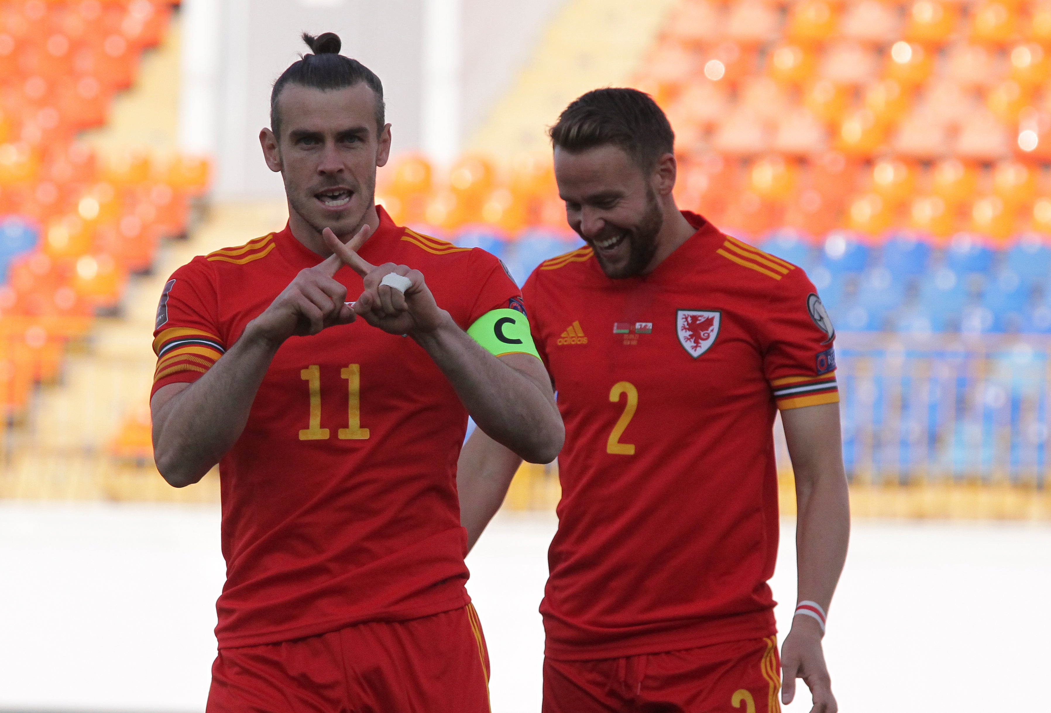 Gareth Bale (left) celebrates scoring in Wales’ 3-2 World Cup qualifying victory over Belarus in Kazan (Alexei Nasyrov/AP)