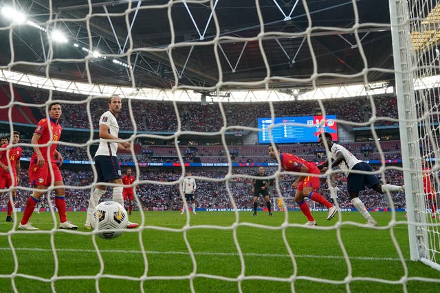 <p>Bukayo Saka heads home England’s fourth goal at Wembley on Sunday </p>