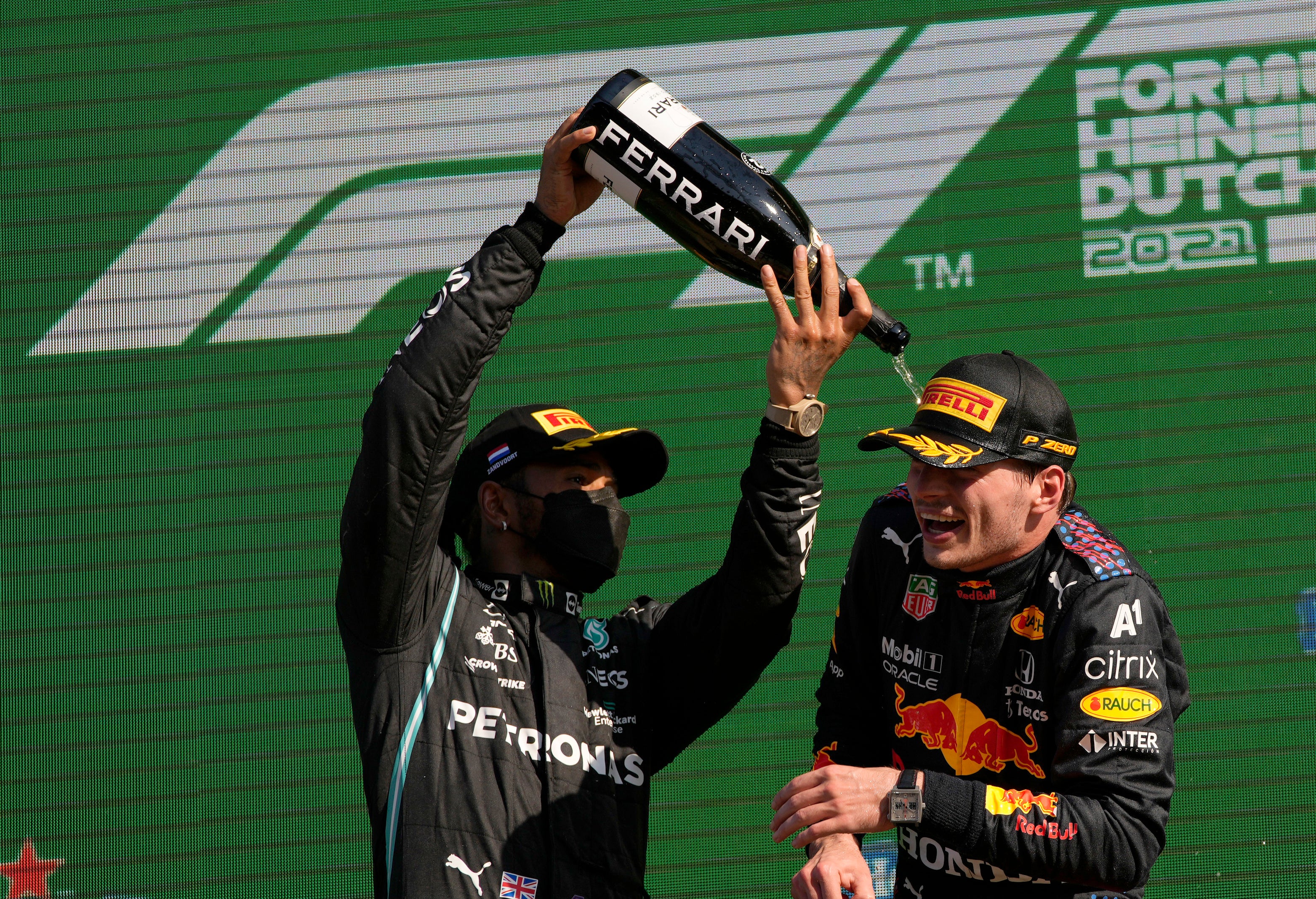 Red Bull driver Max Verstappen, right, replaced Lewis Hamilton on top of the F1 standings (Francisco Seco/AP)