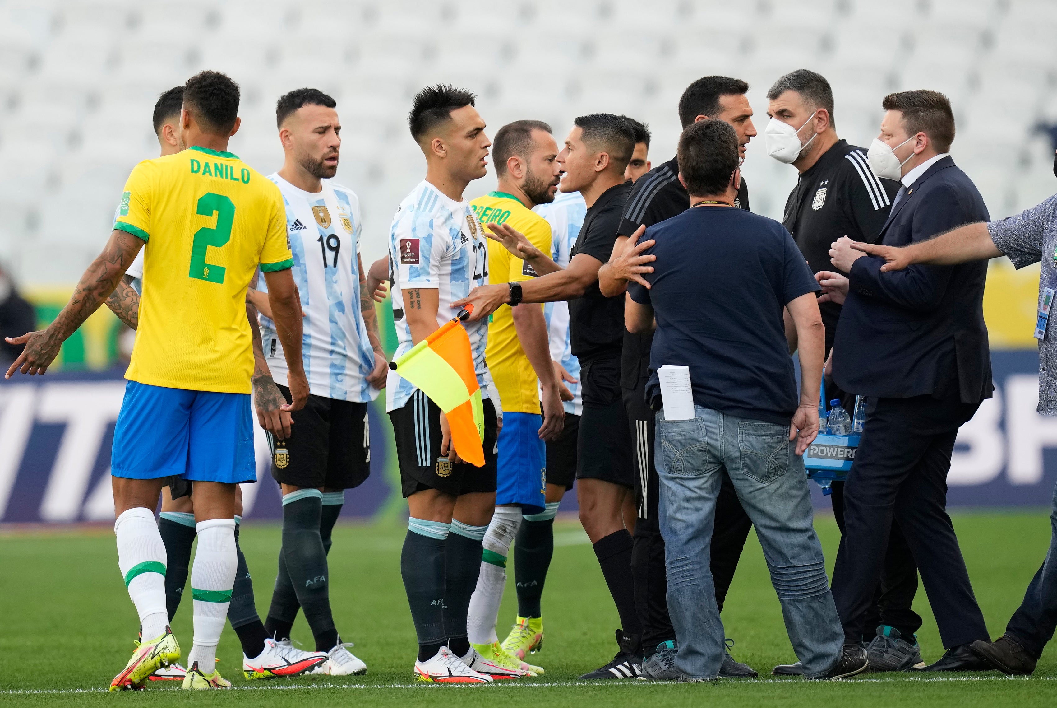 Brazil and Argentina players talk after their World Cup qualifying match in Sao Paulo was suspended due to alleged coronavirus breaches (Andre Penner/AP)