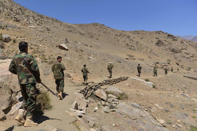 <p>File: Afghan resistance movement and anti-Taliban uprising forces take part in military training at the Abdullah Khil area of Dara district in Panjshir province on 24 August </p>