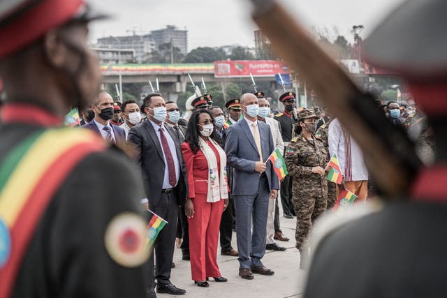 <p>Adanech Abebe, the mayor of Addis Ababa. looks on as the national anthem is played during a ceremony to support the Ethiopian military that is battling against the Tigray People’s Liberation Front in the Amhara and Afar regions</p>