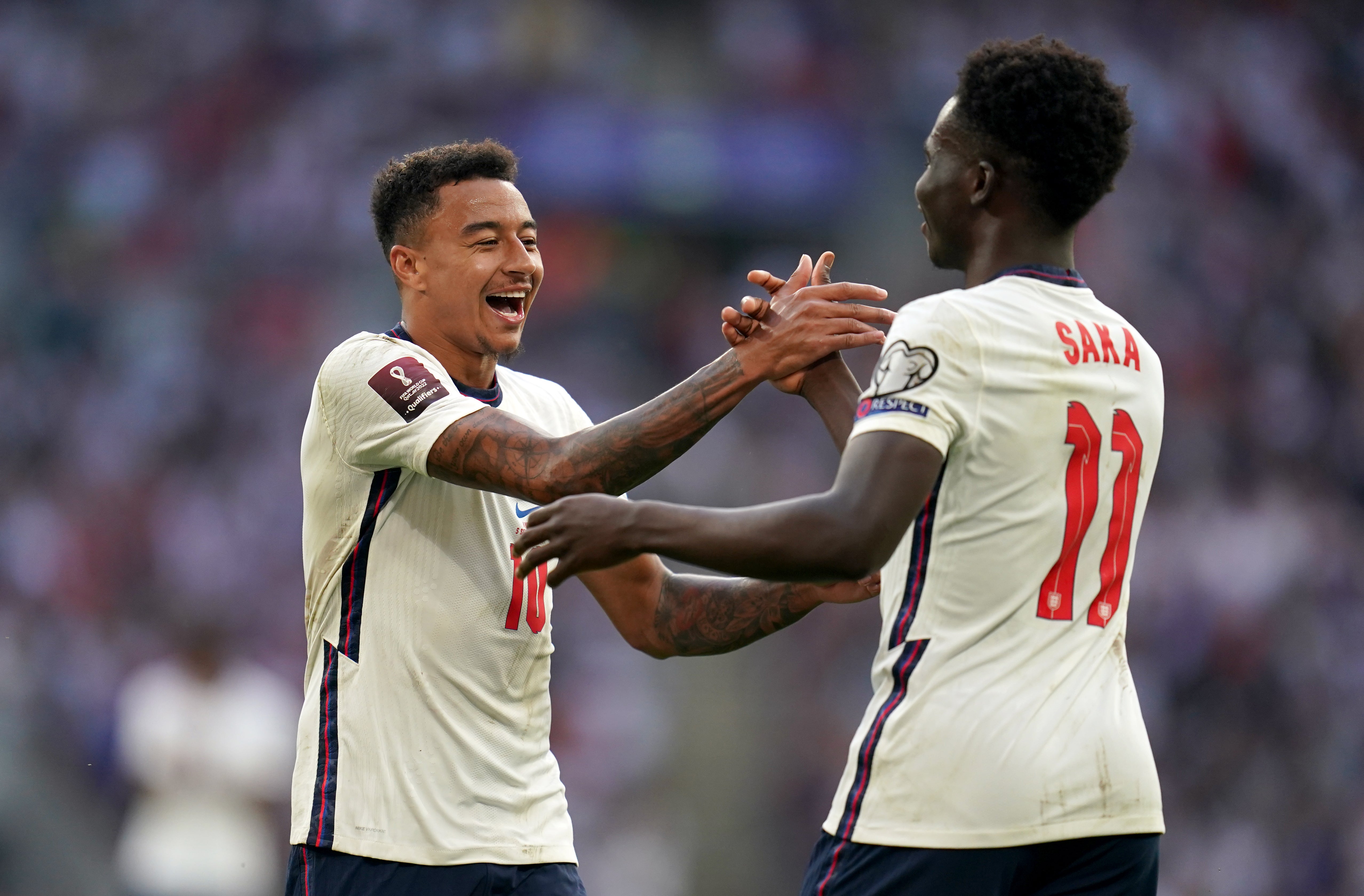 Jesse Lingard, left, and Bukayo Saka, right, scored in the win over Andorra