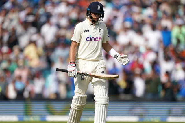 England’s Joe Root reacts after being bowled out by India’s Shardul Thakur (Adam Davy/PA)