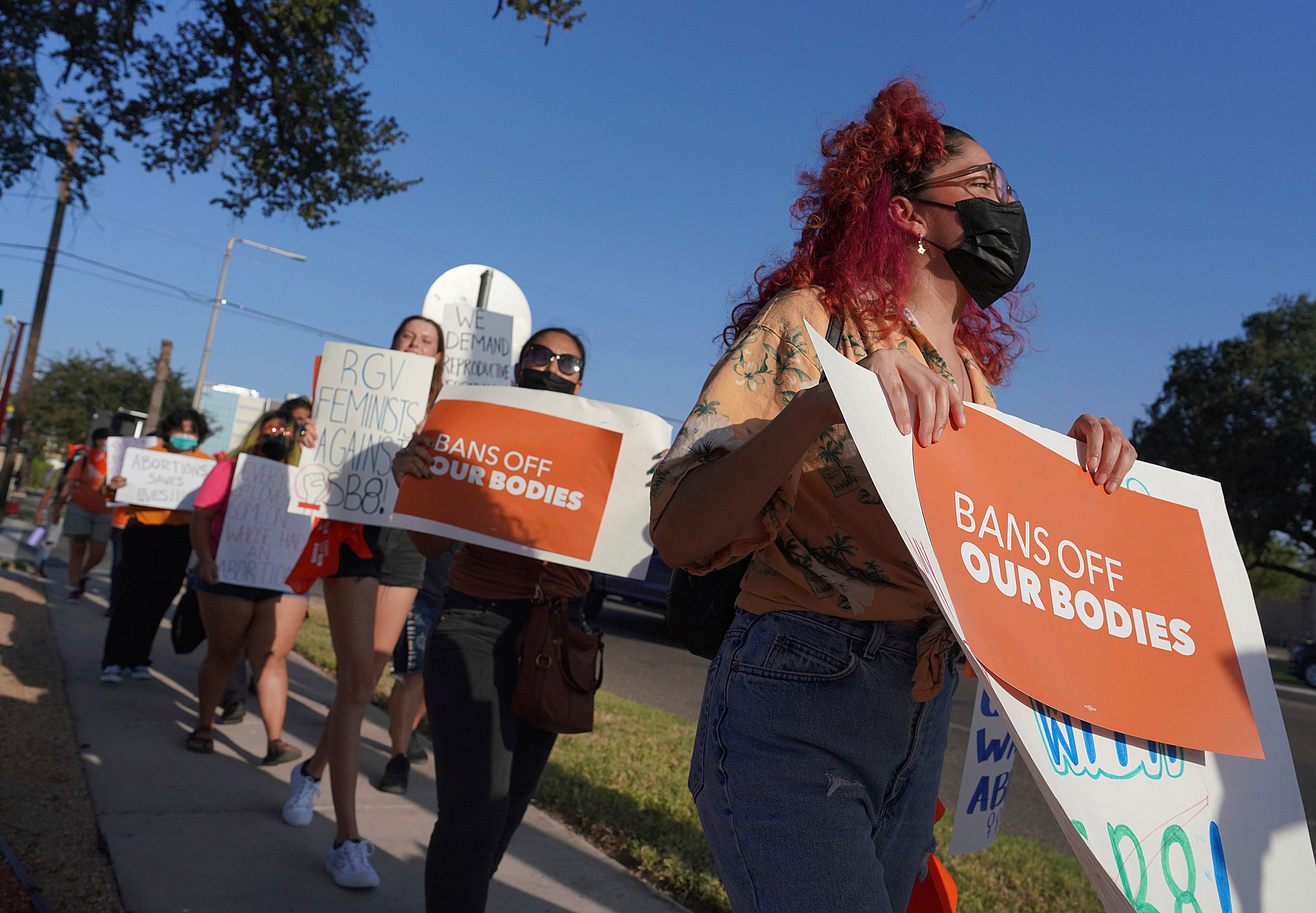 Abortion rights supporters gather to protest Texas abortion law in Edinburg, Texas