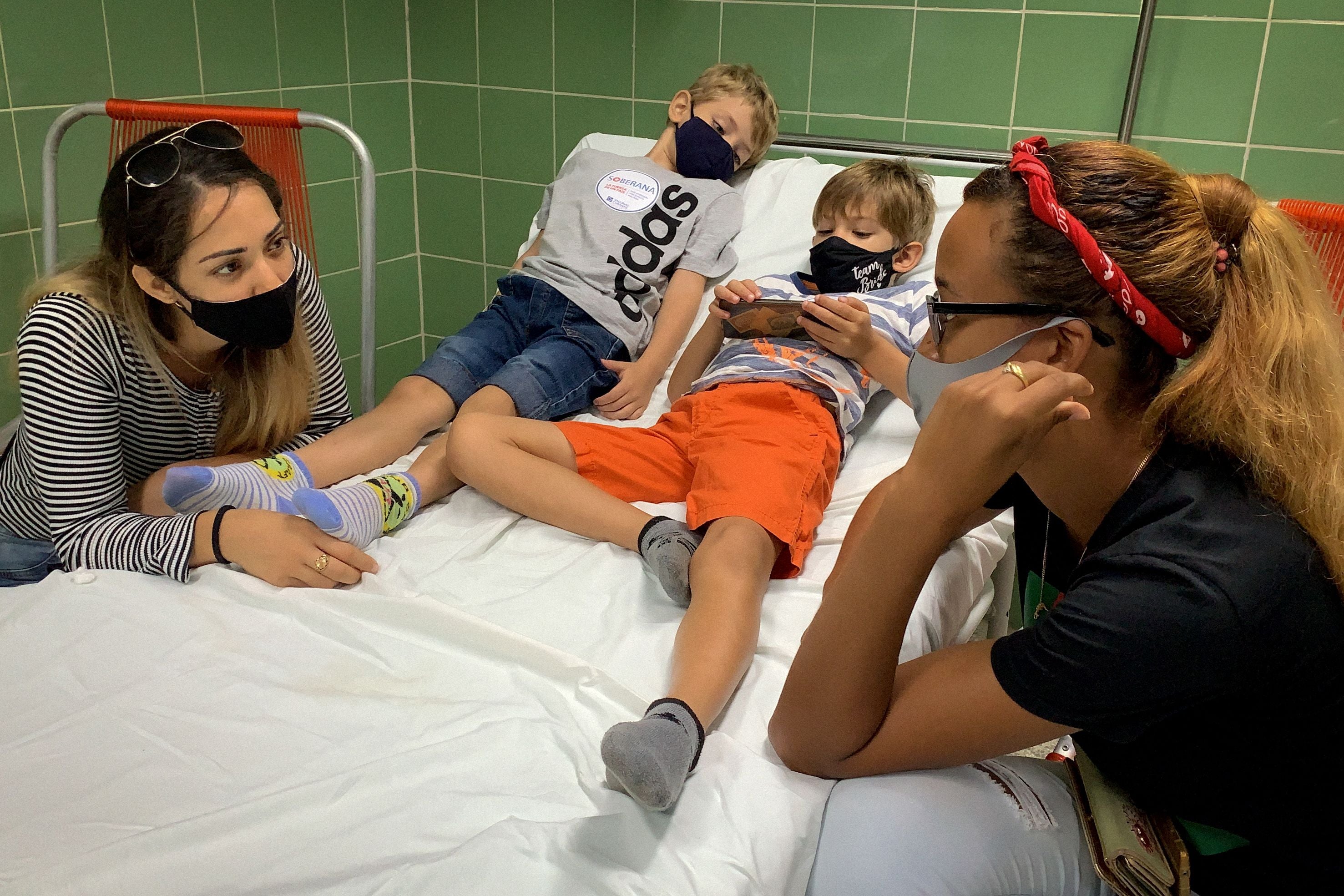 File: Children remain under observation after being vaccinated against Covid-19 with Cuban vaccine Soberana on 24 August 2021 in Havana