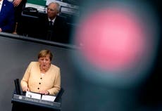 Merkel seeks to boost party before vote, clashes with deputy