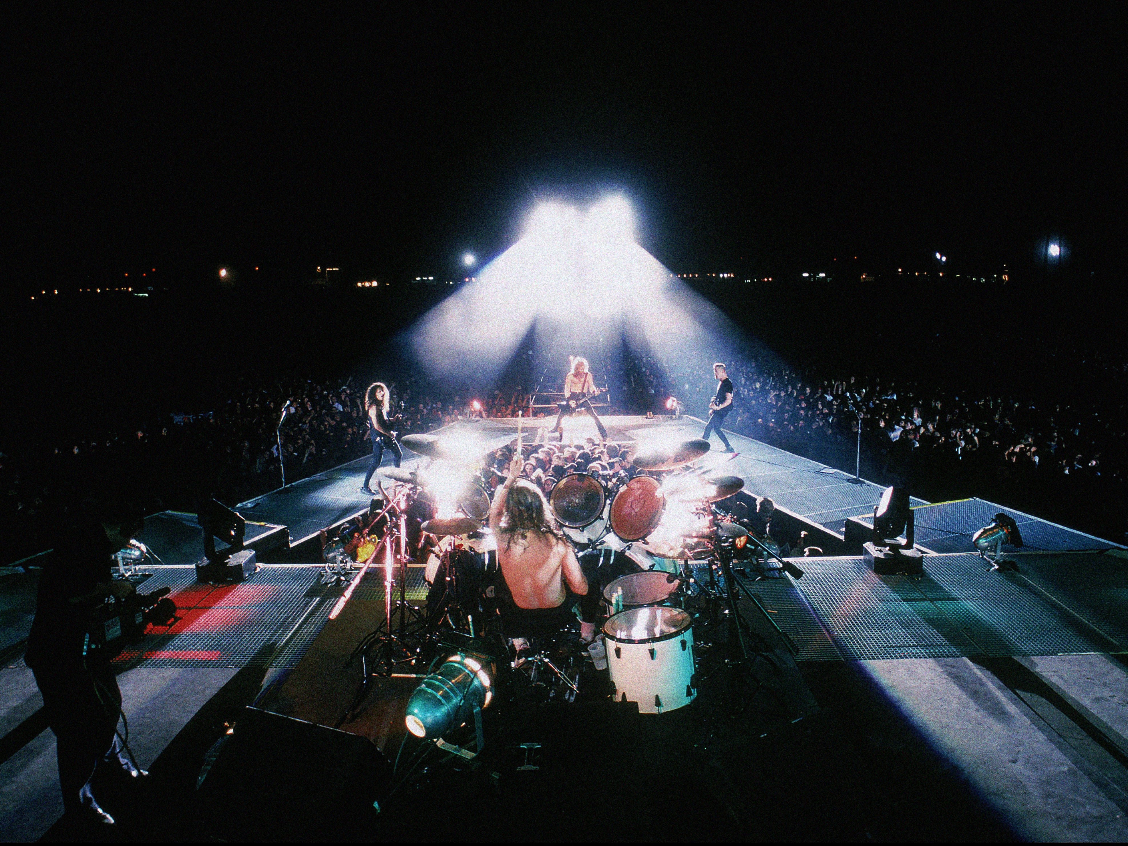 Metallica (L-R) Kirk Hammett, Lars Ulrich(back to camera) James Hetfield, Jason Newsted on the Nowhere Else to Roam tour, 1993