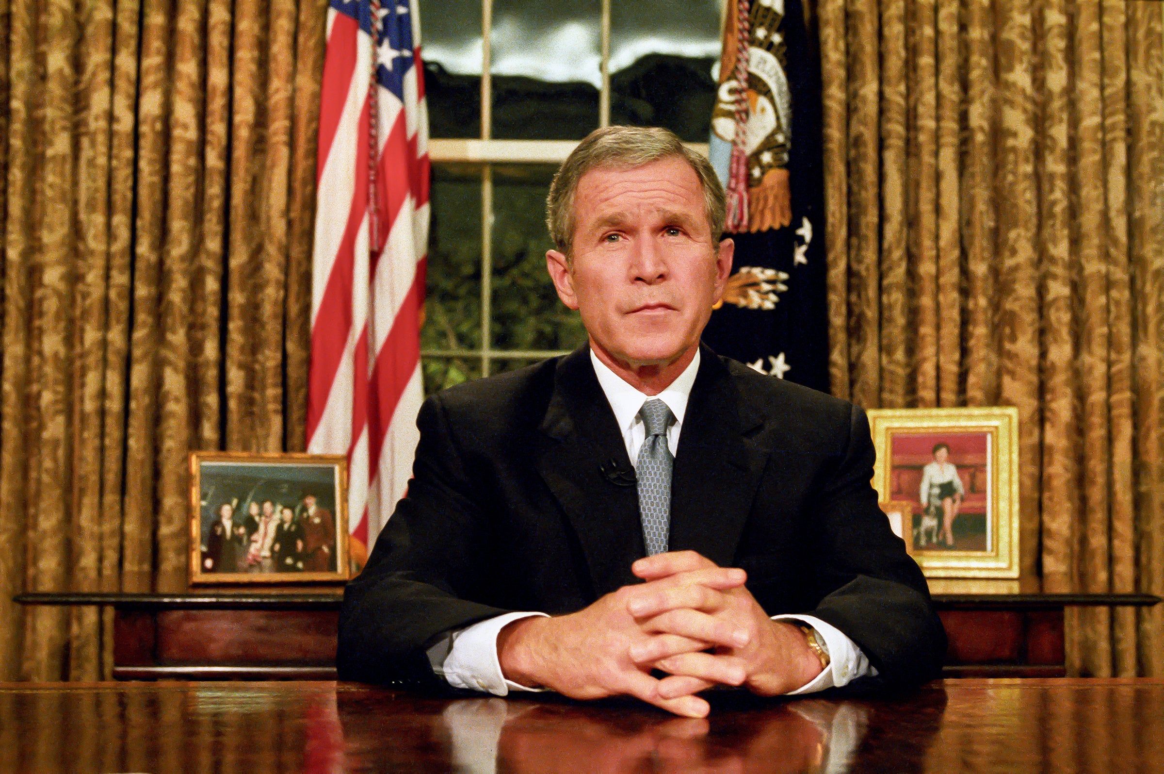 President George W Bush in the Oval Office after the terrorist attacks of 11 September 2001