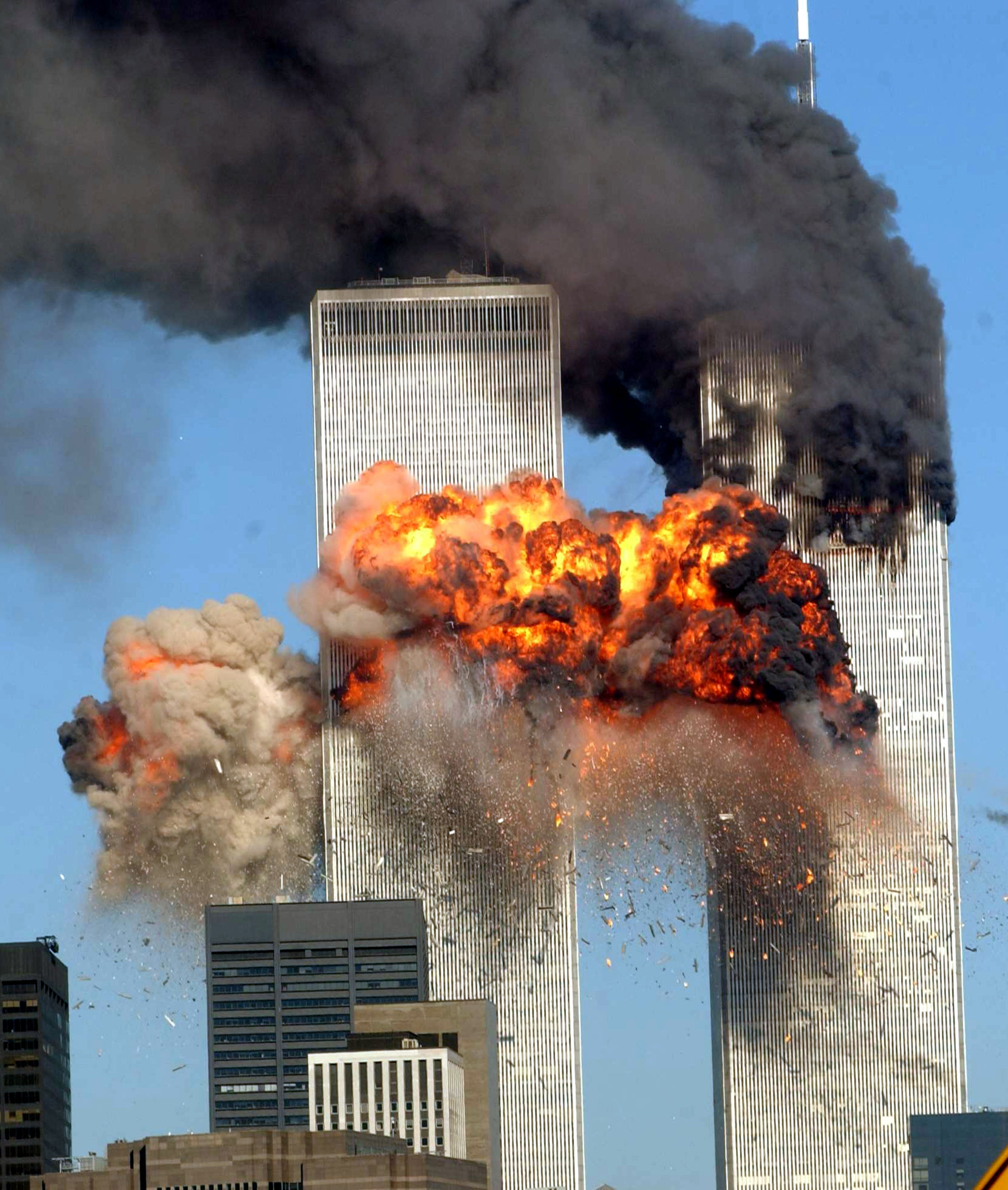The South Tower is hit, becoming engulfed in flames