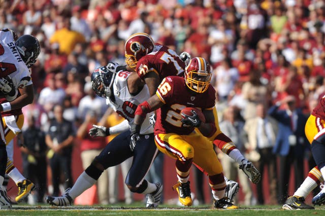 <p>Clinton Portis #26 of the Washington Redskins runs the ball during the game against the Houston Texans at FedExField on September 19, 2010 in Landover, Maryland. </p>