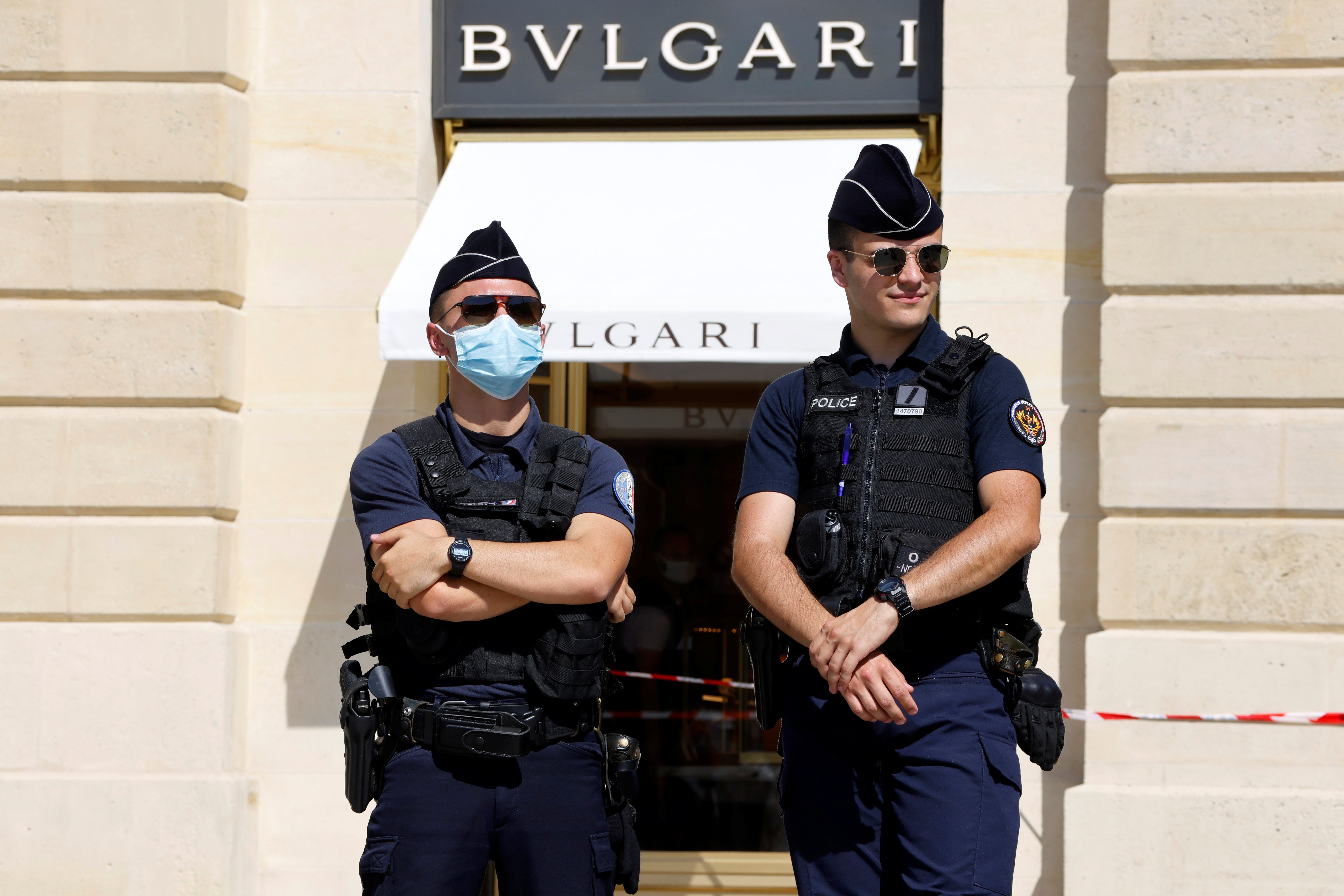 French police stand in front of the Bulgari jewellery store following a robbery at Place Vendome in Paris