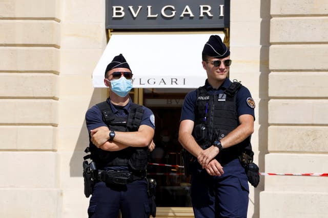 <p>French police stand in front of the Bulgari jewellery store following a robbery at Place Vendome in Paris</p>