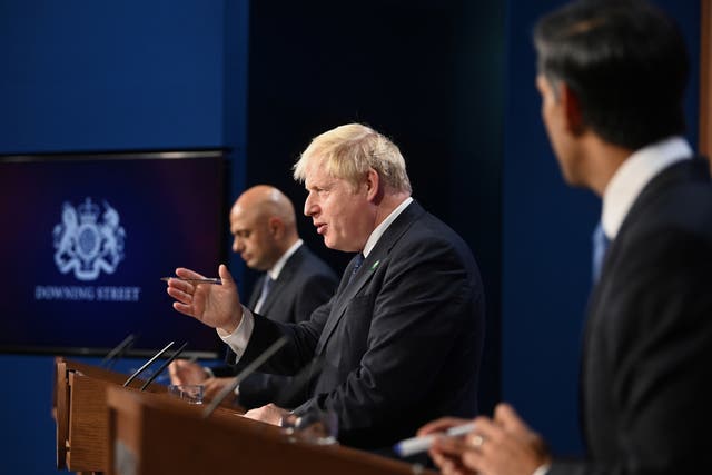 <p>Sajid Javid, Boris Johnson and Rishi Sunak on 7 September, announcing the tax rise for the NHS and social care </p>
