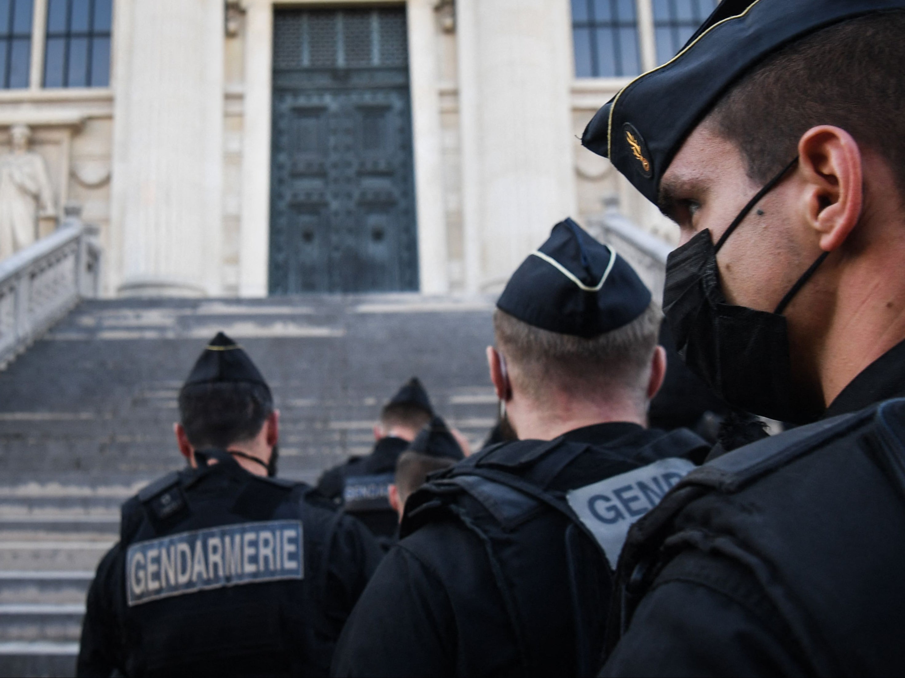French Gendarmes arrive at the Palais de Justice of Paris ahead of the start of the trial into the 2015 Paris attacks