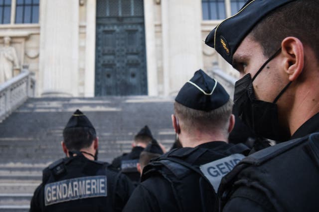 <p>French Gendarmes arrive at the Palais de Justice of Paris ahead of the start of the trial into the 2015 Paris attacks</p>