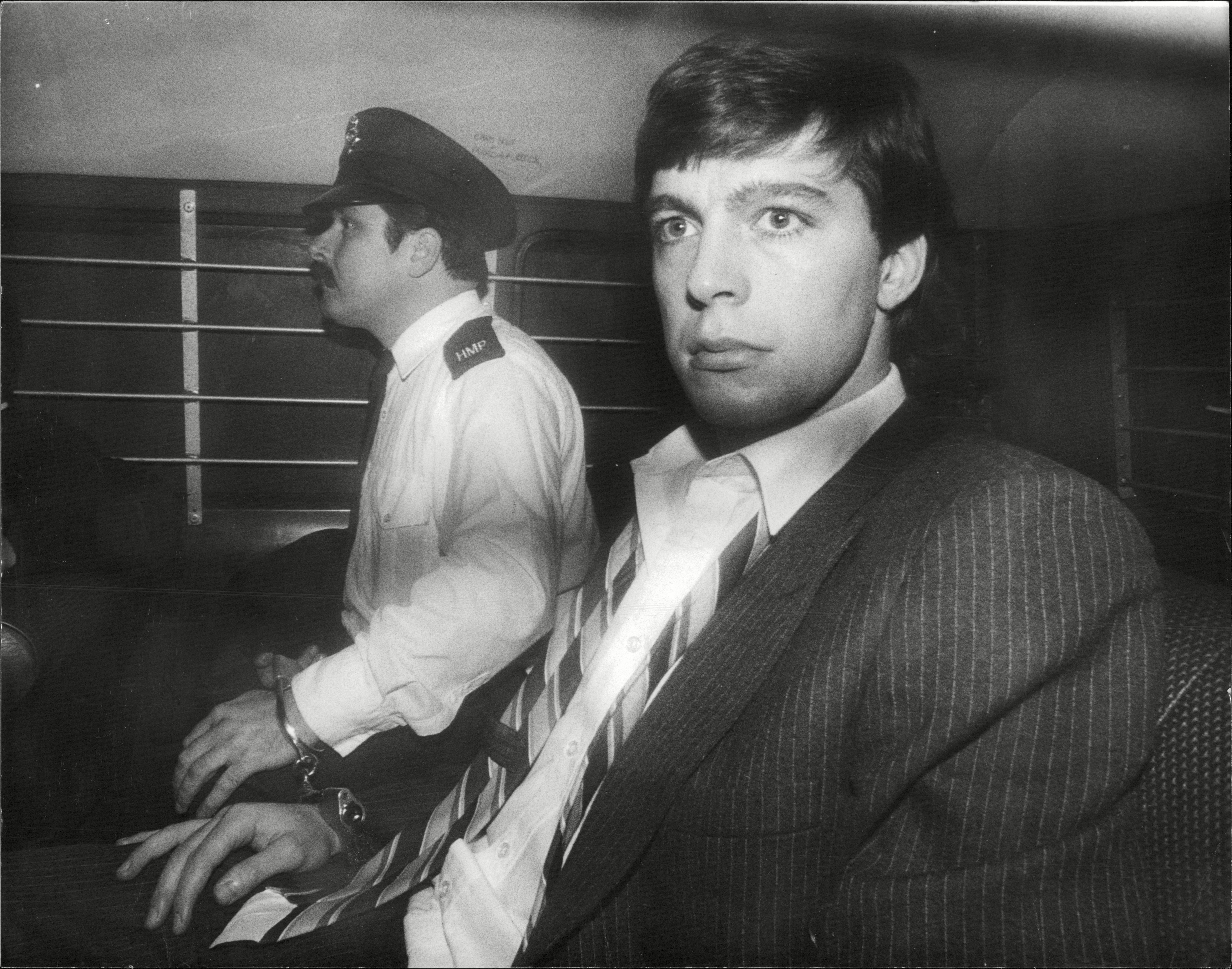 Jeremy Bamber is driven away from court to start his life sentence for the murder of his family in 1986
