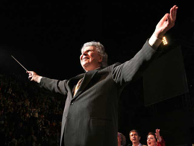 <p>Theodorakis directing his orchestra during a gala concert at the Herodes Atticus Ancient Theatre in Athens</p>