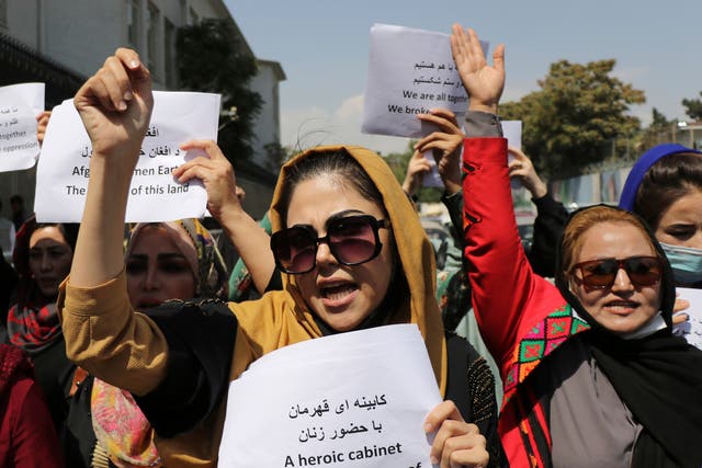 <p>Women assemble to call for their rights under Taliban rule at a protest in the capital of Kabul in early September </p>