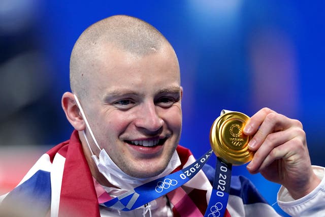 Adam Peaty with his 100m breastroke gold medal at the Tokyo Olympics (Adam Davy/PA).