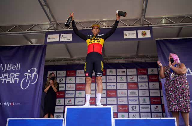 Team Jumbo-Visma’s Wout Van Aert celebrates on the podium after winning stage one of the AJ Bell Tour of Britain from Penzance to Bodmin. Picture date: Sunday September 5, 2021.