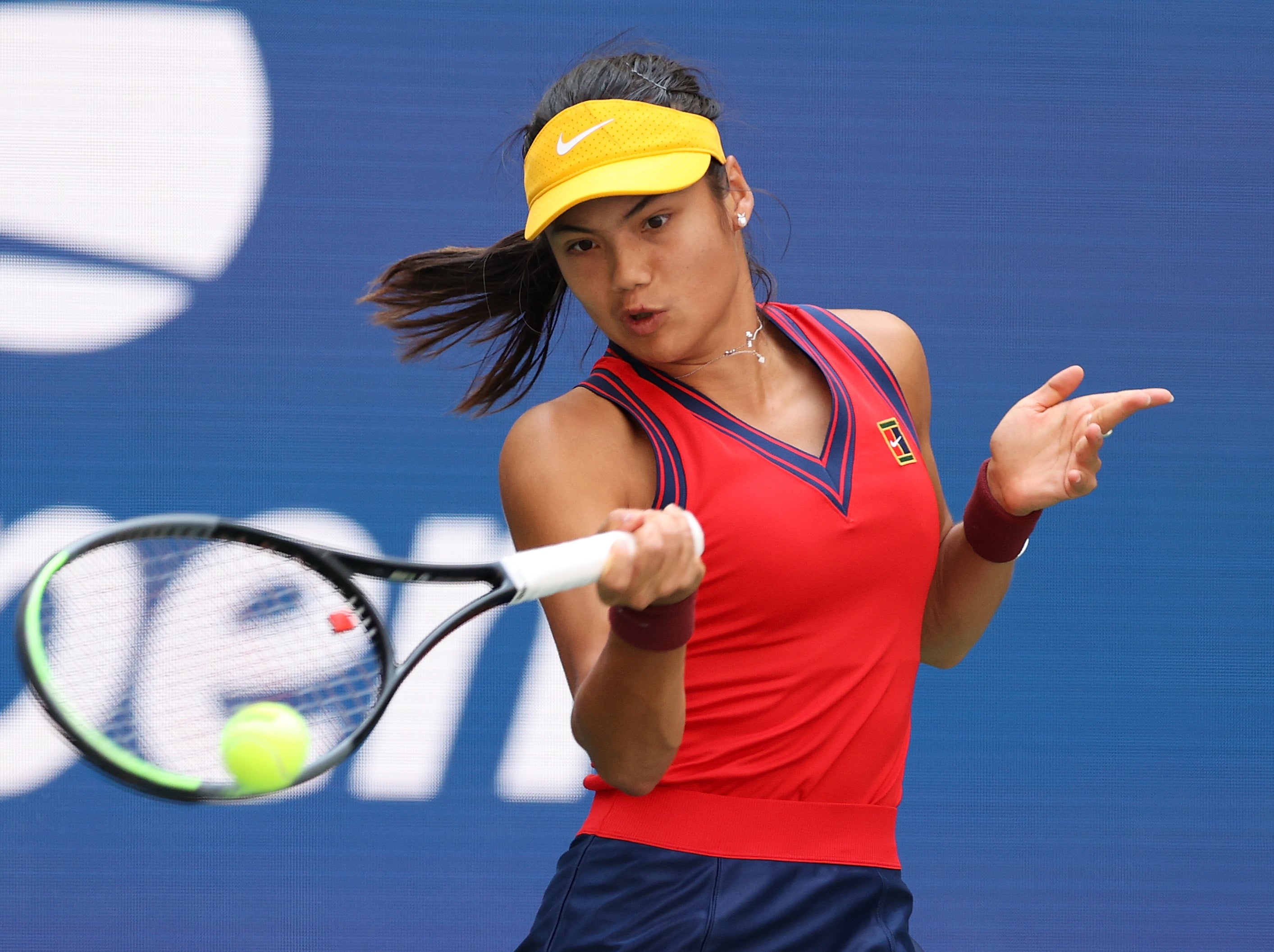 Emma Raducanu plays a forehand against Belinda Bencic