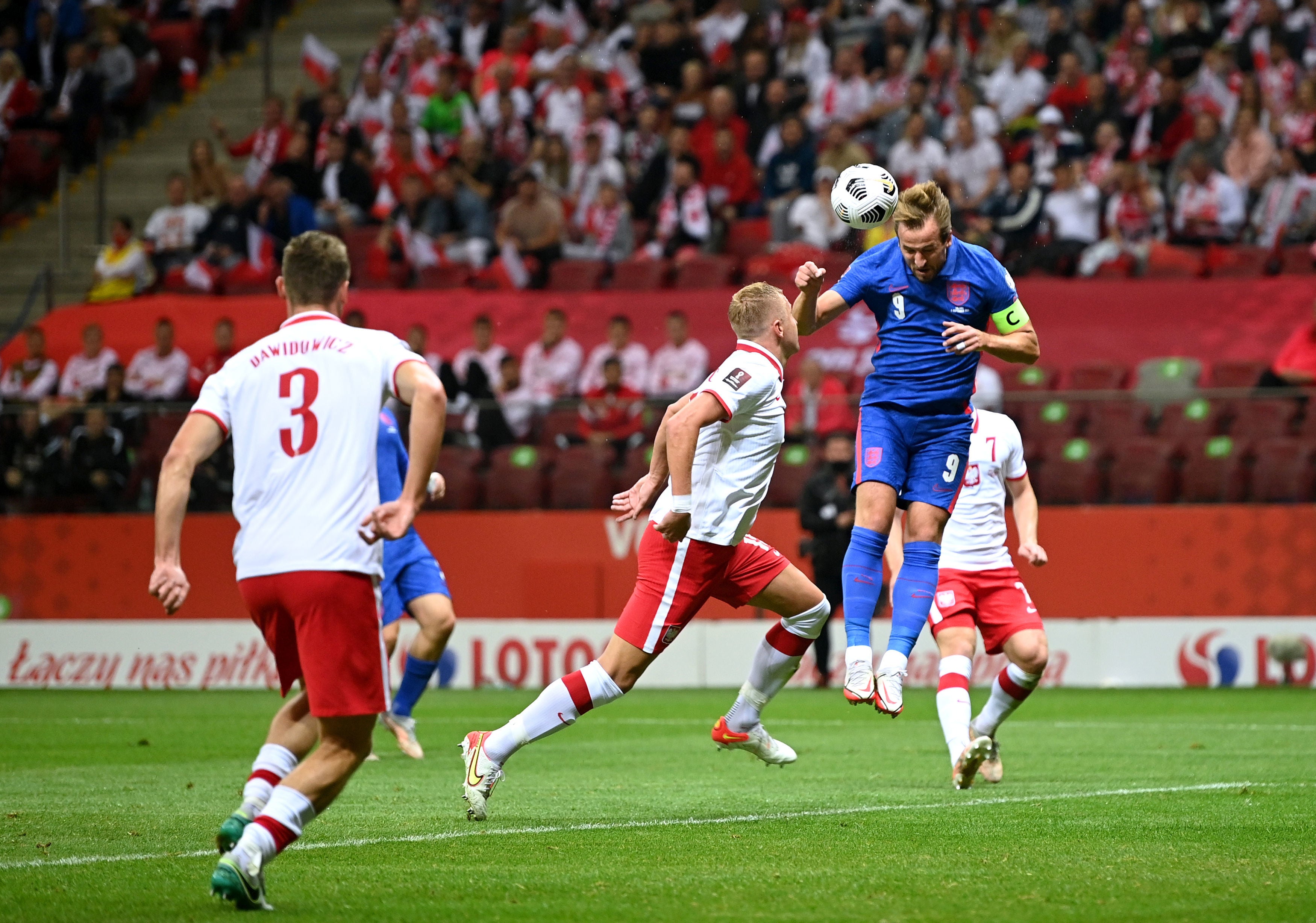 Harry Kane attempts a header on goal