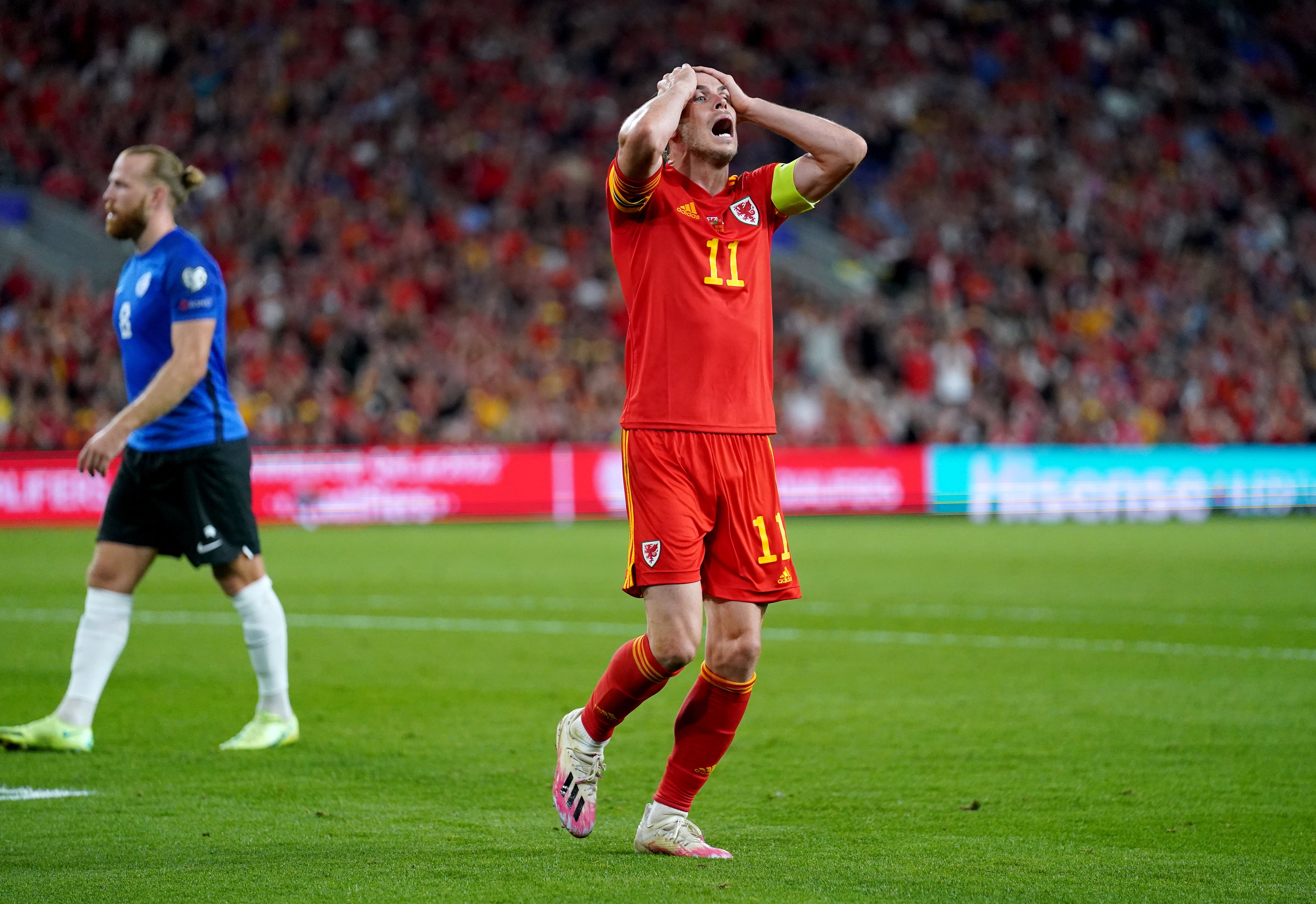 Gareth Bale holds his head after missing a chance for Wales in their World Cup qualifying draw against Estonia (Nick Potts/PA)