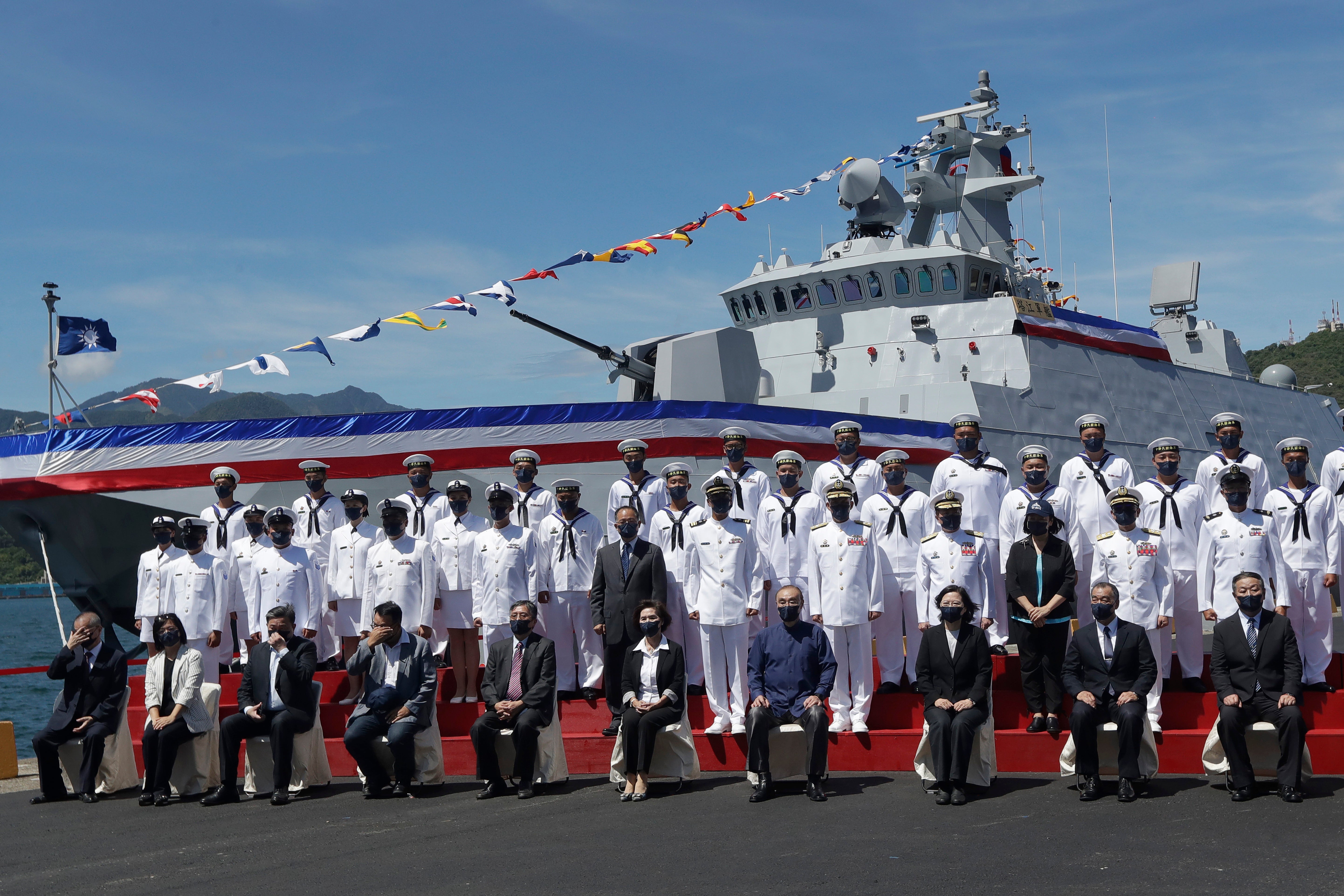 Taiwan's president oversaw the commissioning of the new domestically made navy warship Thursday as part of the island's plan to boost indigenous defense capacity amid heightened tensions with China