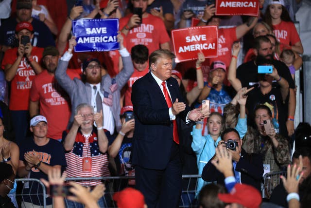 <p>File: Donald Trump applauds as he finishes addressing a ‘Save America’ rally at York Family Farms on 21 August 2021 in Cullman, Alabama</p>