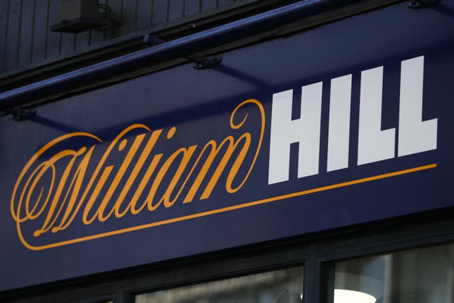 Online gambling group 888 has agreed a £2.2 billion deal to buy William Hill’s European business and its 1,400 UK betting shops in a move that will see it return to British hands (PA)