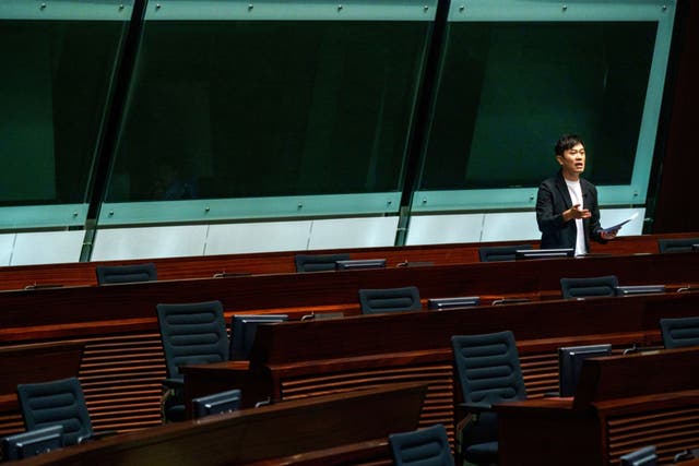<p>Cheng Chung-tai during a legislative council meeting in Hong Kong in May</p>