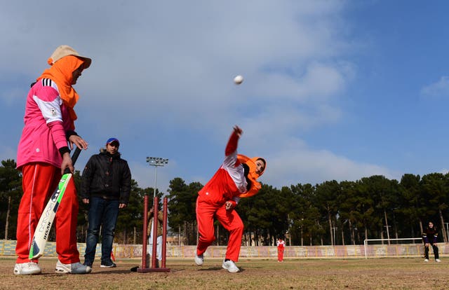 <p>Afghan women play cricket in Herat on 9 December 2015</p>