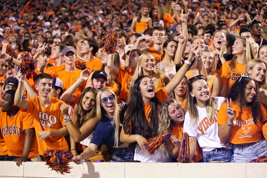 Critics slam 2021 college football season as maskless fans pack