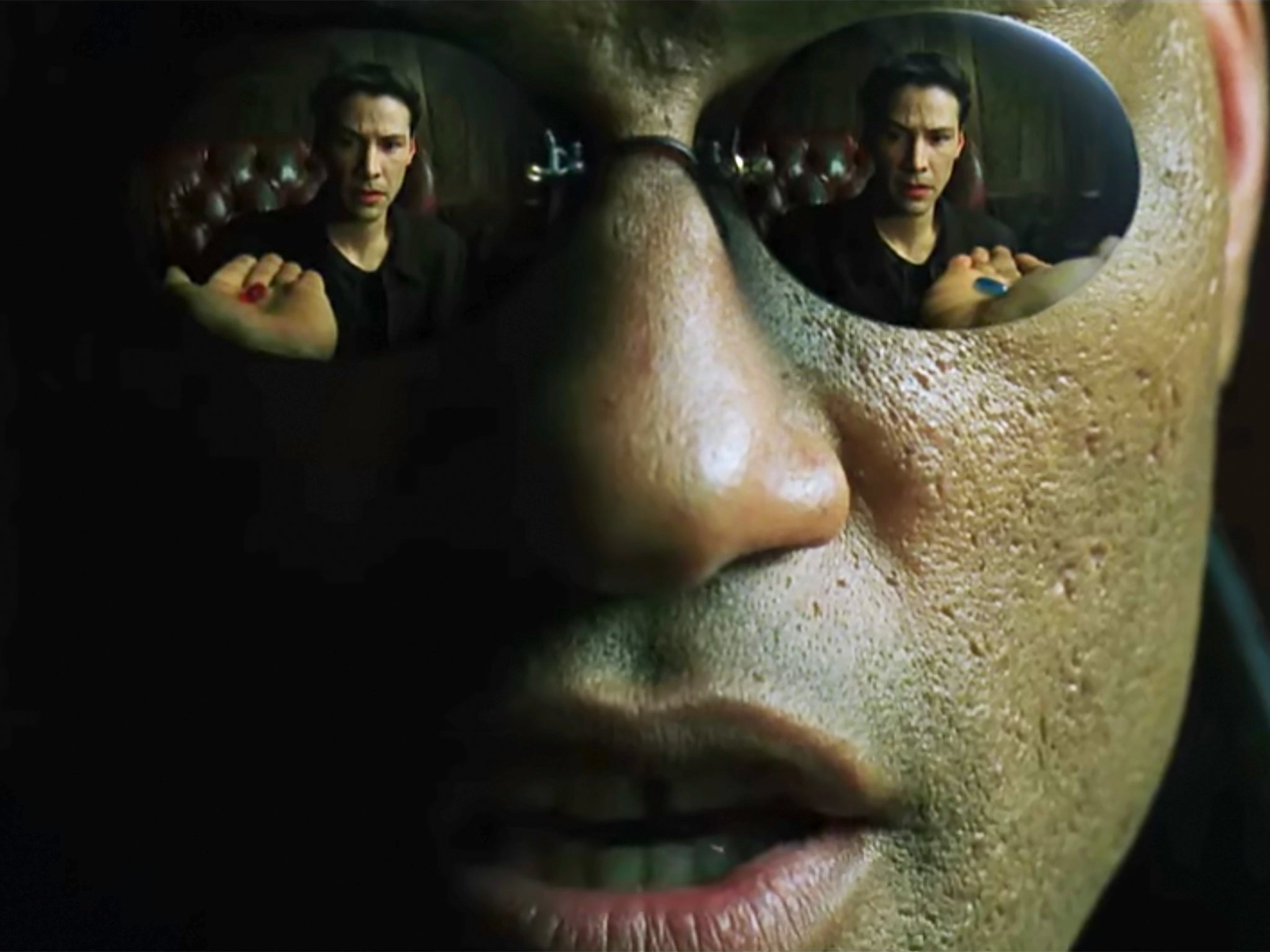 Neo (Keanu Reeves) is offered a red pill or a blue pill by Morpheus (Laurence Fishburne) in ‘The Matrix’