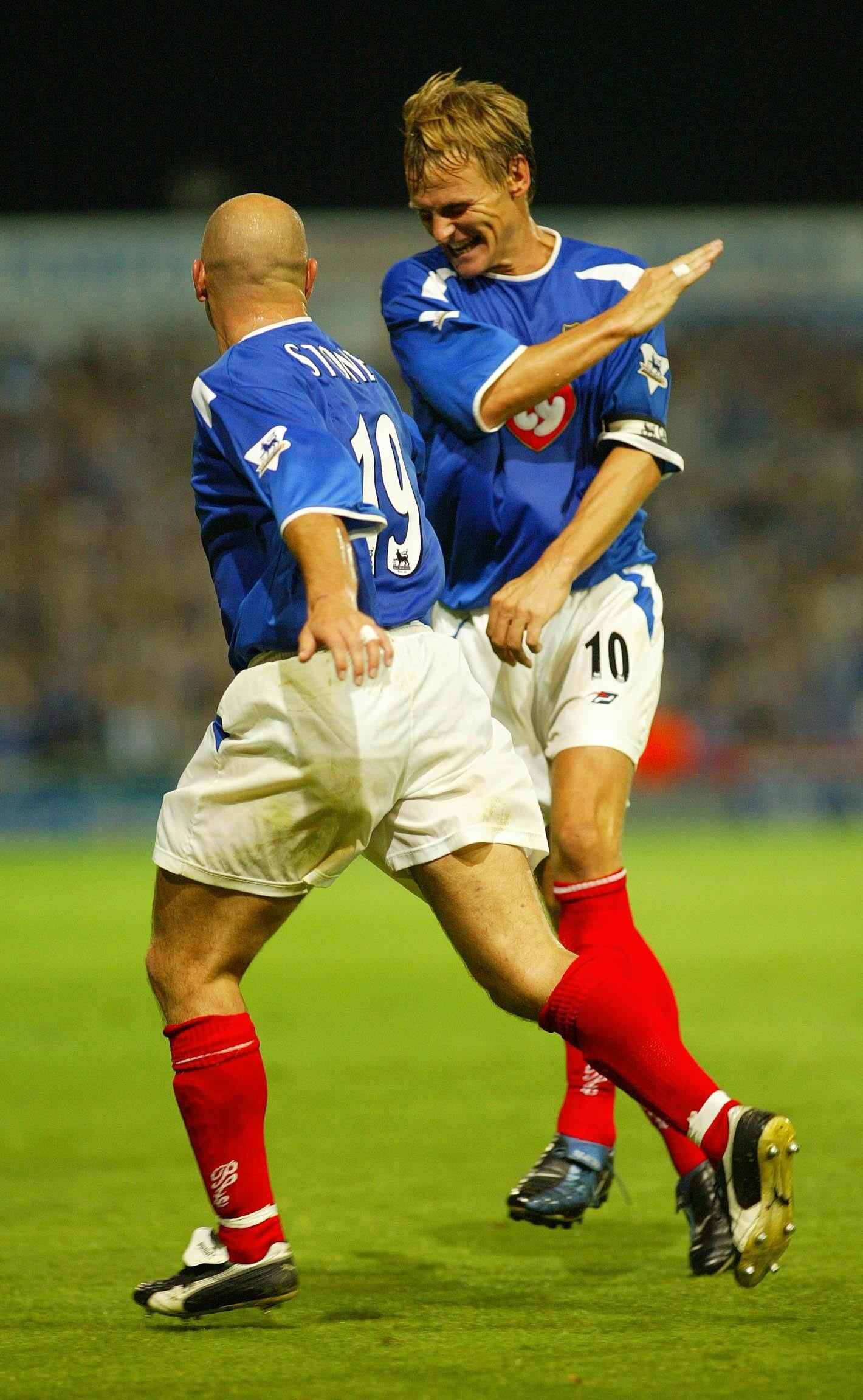 A 37-year-old Teddy Sheringham, right, celebrates a goal for Portsmouth (Chris Ison/PA)