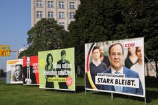 German elections: CDU resorts to ‘Red Scare’ tactics as speculation begins on likely coalitions