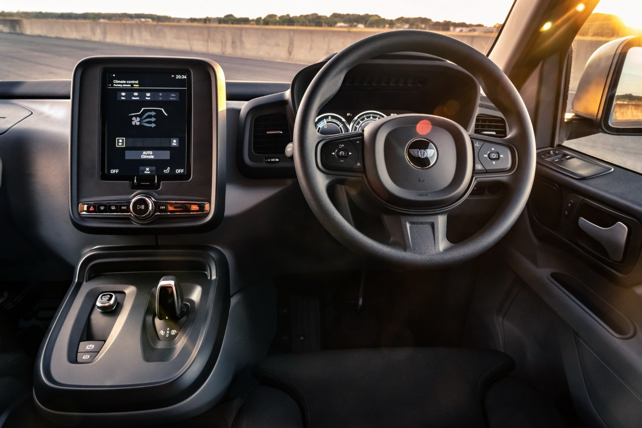 The portrait-format touchscreen, switches and minor controls are Volvo-sourced