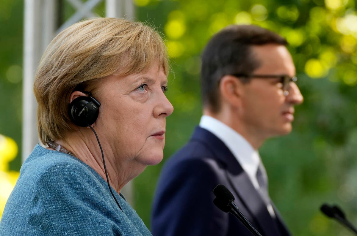 Merkel calls migrant push at EU's border 'unacceptable'