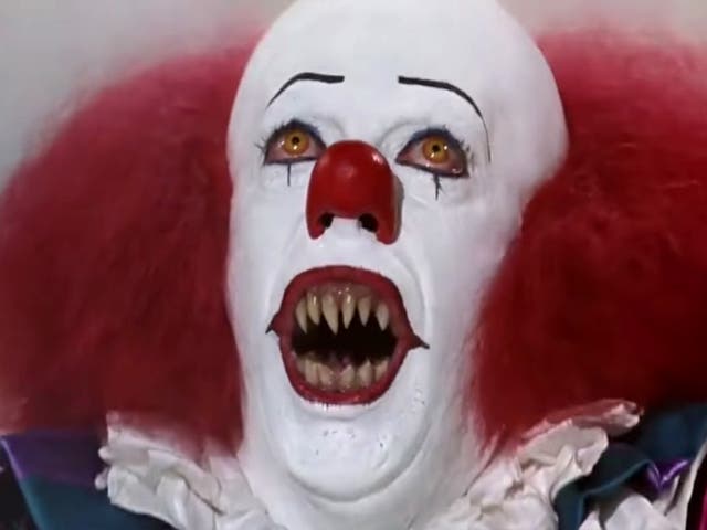 <p>Tim Curry as Pennywise the clown in Stephen King’s ‘It’ </p>